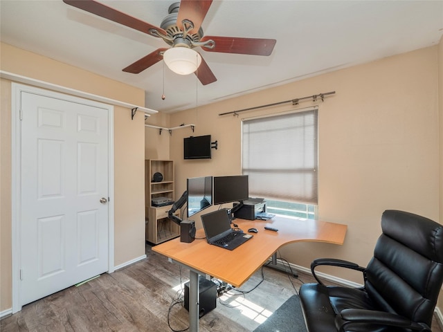 16501 Spotted Eagle Dr, Leander, TX 78641 - office area with ceiling fan and wood finished floors