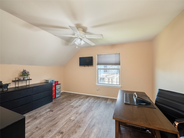 16501 Spotted Eagle Dr, Leander, TX 78641 - office area featuring wood finished floors, a ceiling fan, and lofted ceiling
