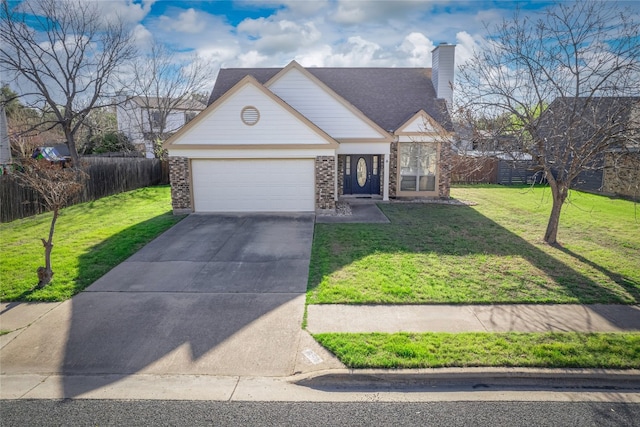 16501 Spotted Eagle Dr, Leander, TX 78641 - traditional-style house with a garage, concrete driveway, a chimney, and brick siding