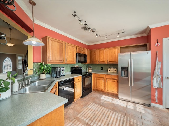 16501 Spotted Eagle Dr, Leander, TX 78641 - kitchen featuring black appliances, light countertops, tasteful backsplash, hanging light fixtures, and ornamental molding