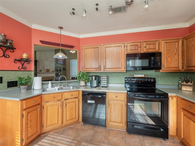 16501 Spotted Eagle Dr, Leander, TX 78641 - kitchen with black appliances, decorative backsplash, ornamental molding, light tile patterned floors, and light countertops