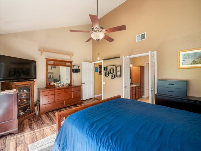 16501 Spotted Eagle Dr, Leander, TX 78641 - bedroom with high vaulted ceiling, light wood-type flooring, and ceiling fan