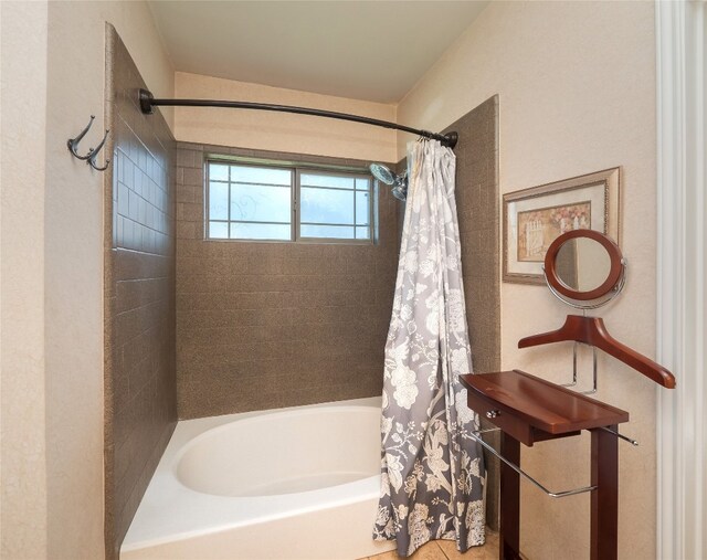 16501 Spotted Eagle Dr, Leander, TX 78641 - full bathroom with shower / bath combo with shower curtain