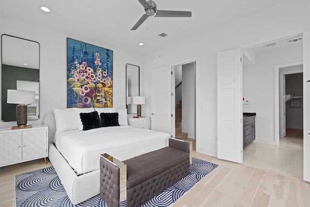 bedroom featuring recessed lighting, baseboards, light wood-type flooring, and visible vents