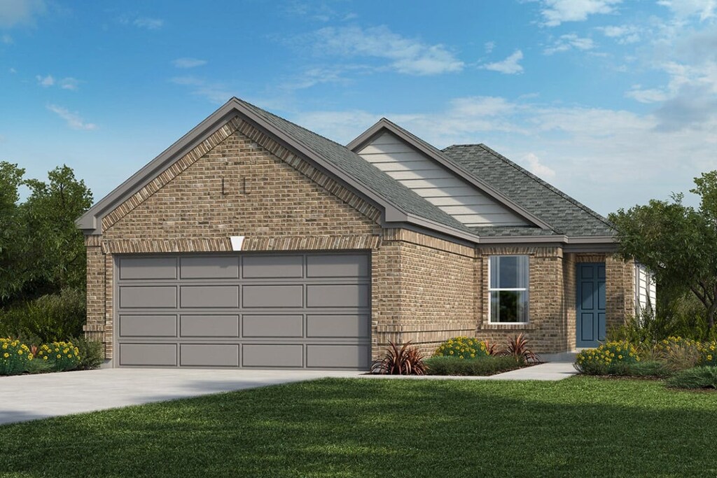 12106 Cantabria Rd, Austin, TX 78748 - single story home with a front lawn, brick siding, an attached garage, and driveway