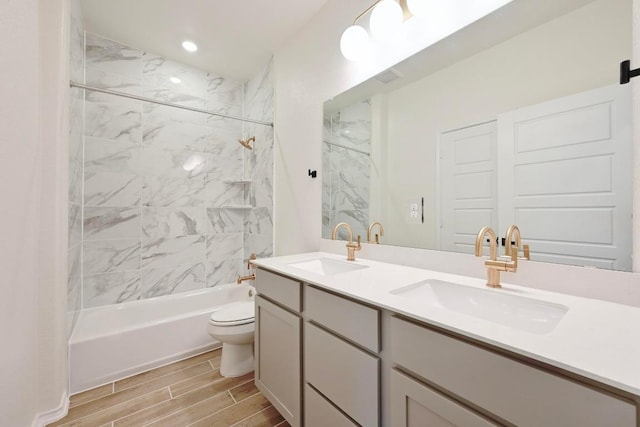 12106 Cantabria Rd, Austin, TX 78748 - full bathroom with wood finish floors, double vanity, and bathtub / shower combination