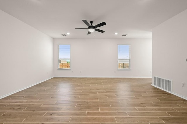 12106 Cantabria Rd, Austin, TX 78748 - spare room with wood finished floors, healthy amount of natural light, ceiling fan, and recessed lighting