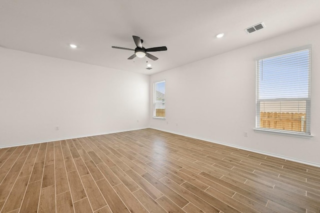 12106 Cantabria Rd, Austin, TX 78748 - unfurnished room with wood finished floors, a ceiling fan, and recessed lighting