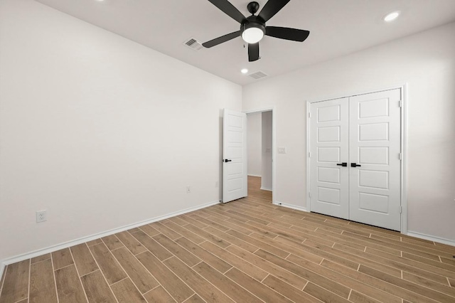 12106 Cantabria Rd, Austin, TX 78748 - unfurnished bedroom with light wood-type flooring, a closet, a ceiling fan, and recessed lighting