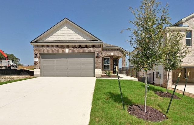 12106 Cantabria Rd, Austin, TX 78748 - view of front facade with brick siding, concrete driveway, and an attached garage