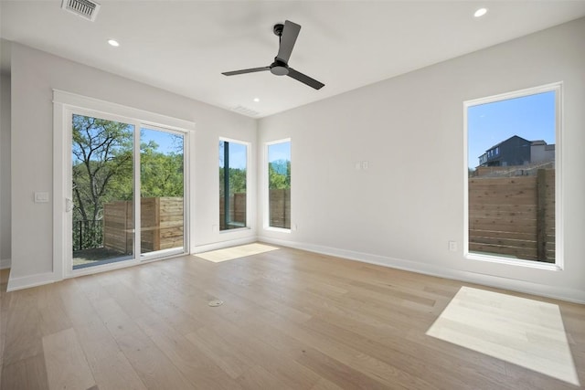 6301 Bristol Cir Unit 2, Austin, TX 78723 - empty room featuring baseboards, wood finished floors, recessed lighting, and ceiling fan