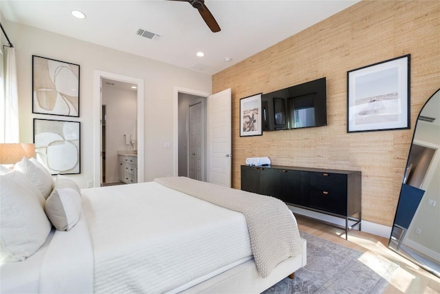 1126 Linden St Unit 1, Austin, TX 78702 - bedroom featuring recessed lighting, baseboards, a ceiling fan, and connected bathroom