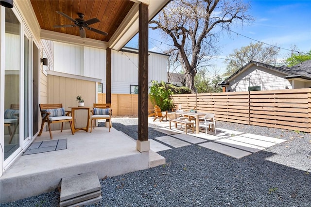 1126 Linden St Unit 1, Austin, TX 78702 - fenced backyard featuring ceiling fan, a patio area, and outdoor dining space