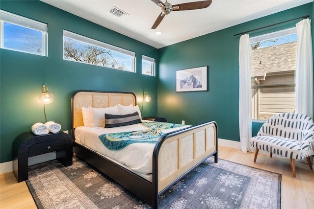 1126 Linden St Unit 1, Austin, TX 78702 - bedroom with wood finished floors, baseboards, ceiling fan, and recessed lighting