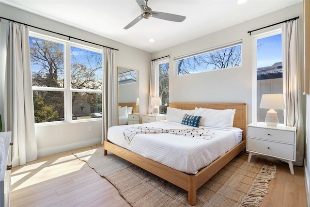 1126 Linden St Unit 1, Austin, TX 78702 - bedroom with wood finished floors, recessed lighting, baseboards, and a ceiling fan