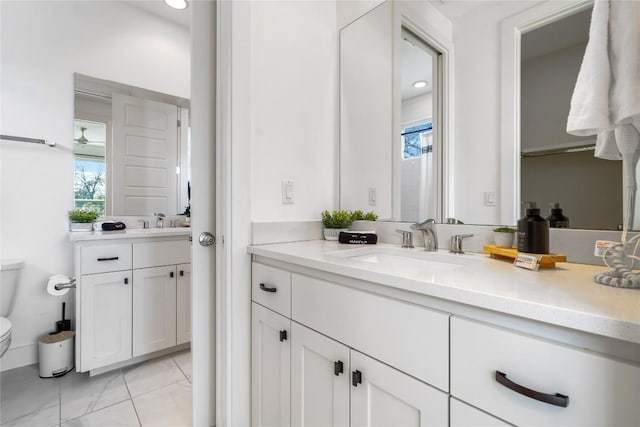 1126 Linden St Unit 1, Austin, TX 78702 - full bathroom featuring toilet, vanity, and recessed lighting
