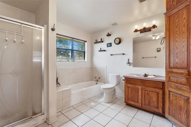 491 Herron Trl, Mcdade, TX 78650 - bathroom with tile patterned flooring, a stall shower, a garden tub, and toilet