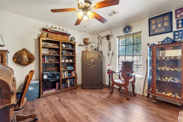 491 Herron Trl, Mcdade, TX 78650 - office space featuring ceiling fan, wood finished floors, and baseboards
