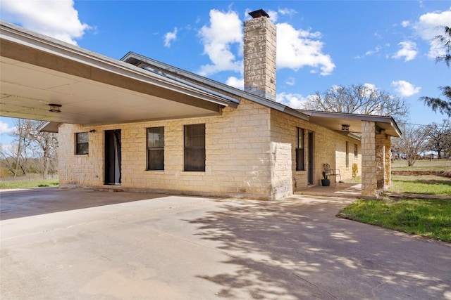 491 Herron Trl, Mcdade, TX 78650 - view of front of home featuring a chimney