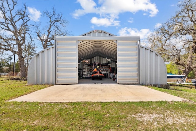 491 Herron Trl, Mcdade, TX 78650 - view of pole building with a yard