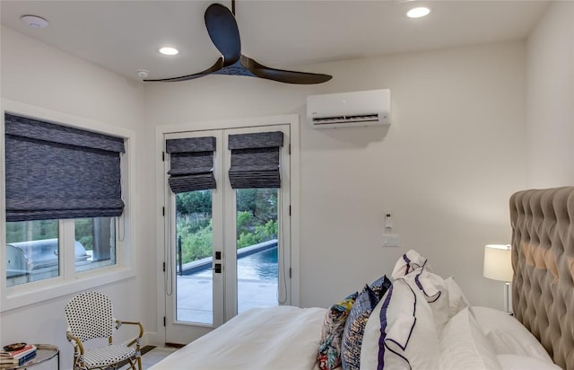 bedroom featuring a wall unit AC, access to outside, recessed lighting, and ceiling fan