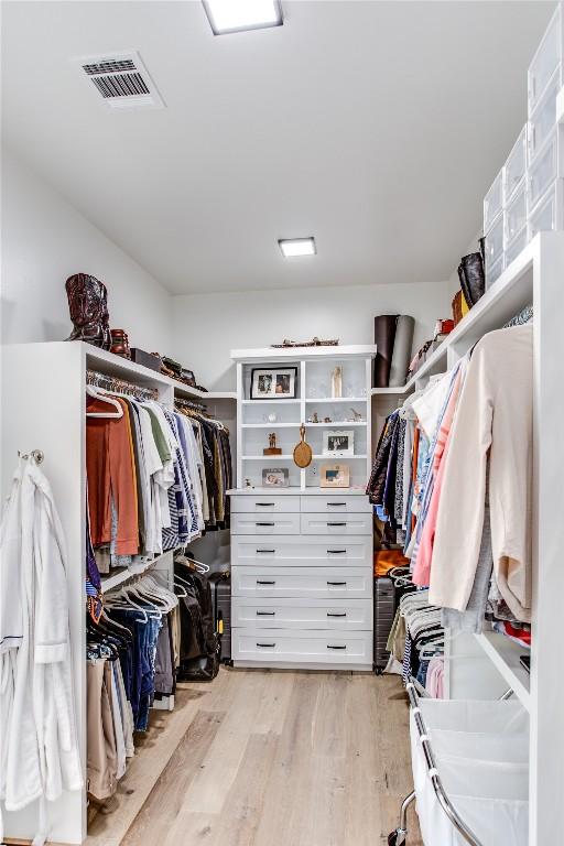spacious closet with visible vents and light wood finished floors
