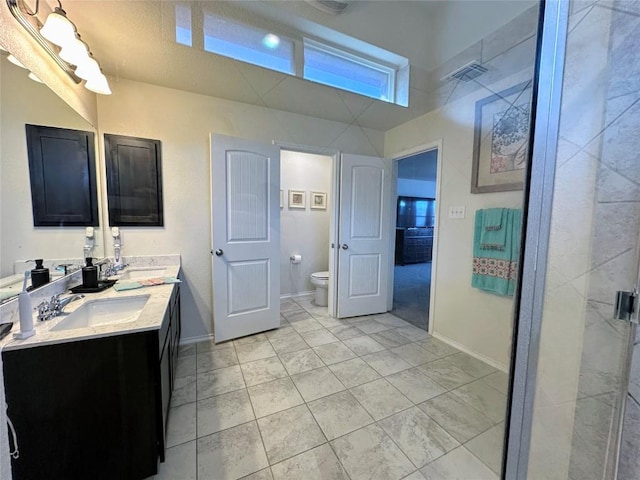 1208 Ravenside Cv, Leander, TX 78641 - bathroom with double vanity and tile patterned flooring