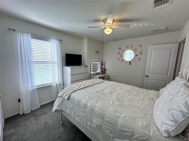 1208 Ravenside Cv, Leander, TX 78641 - carpeted bedroom featuring baseboards and ceiling fan