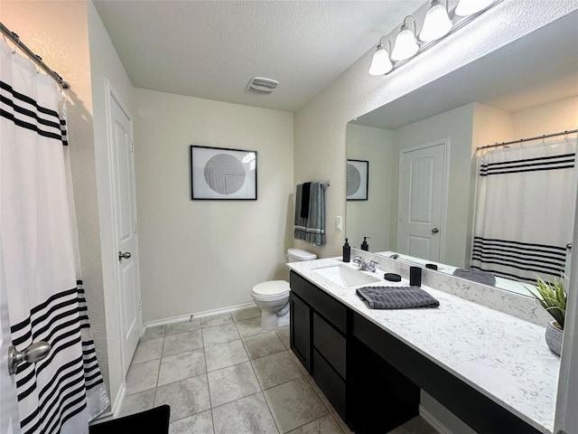 1208 Ravenside Cv, Leander, TX 78641 - bathroom featuring vanity, a textured ceiling, tile patterned floors, and curtained shower