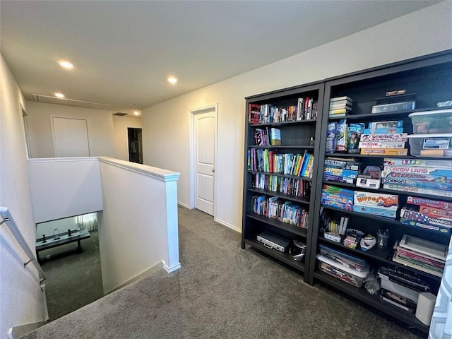1208 Ravenside Cv, Leander, TX 78641 - corridor with an upstairs landing, carpet flooring, and recessed lighting