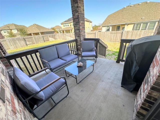 1208 Ravenside Cv, Leander, TX 78641 - fenced backyard featuring an outdoor living space, a grill, and a wooden deck