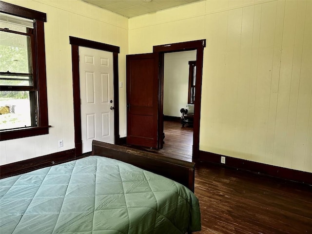 1106 Lexington St, Taylor, TX 76574 - bedroom featuring baseboards and hardwood / wood-style floors
