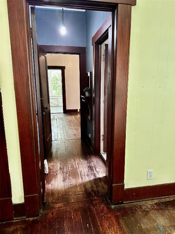 1106 Lexington St, Taylor, TX 76574 - hallway with hardwood / wood-style floors