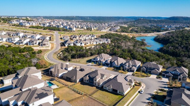 4709 Napoli Shore Dr, Leander, TX 78641 - aerial view of property and surrounding area with nearby suburban area and a large body of water