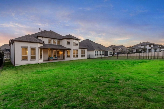 4709 Napoli Shore Dr, Leander, TX 78641 - rear view of property with a patio area, a fenced backyard, and stucco siding