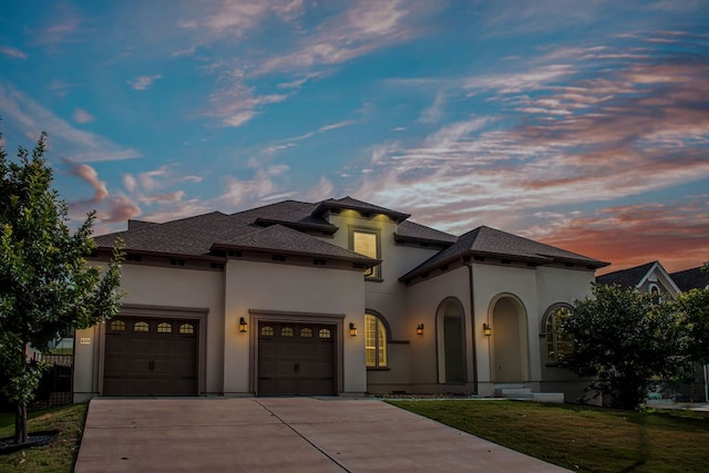 4709 Napoli Shore Dr, Leander, TX 78641 - view of front of property with concrete driveway, a garage, stucco siding, and a shingled roof