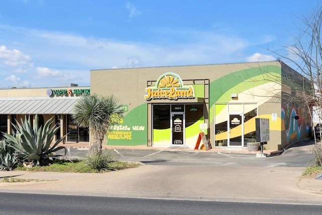 2712 Windswept Cv, Austin, TX 78745 - view of building exterior with uncovered parking