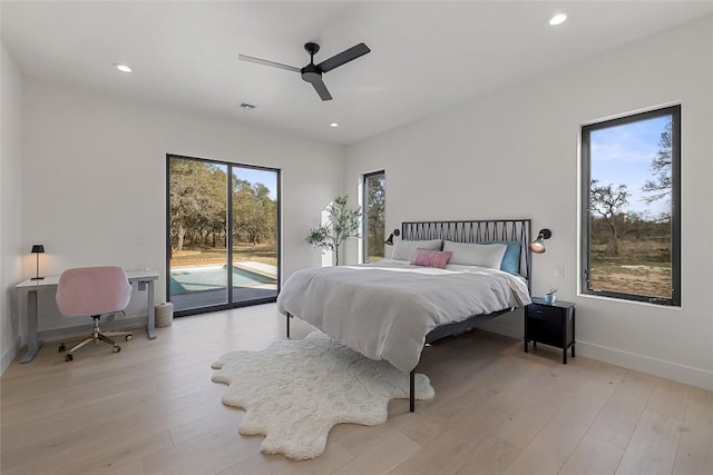 bedroom with baseboards, access to exterior, visible vents, and light wood-style floors