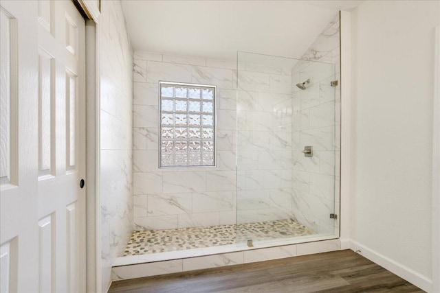 3905 Stonehenge Path, Round Rock, TX 78681 - bathroom with a walk in shower, wood finished floors, and baseboards