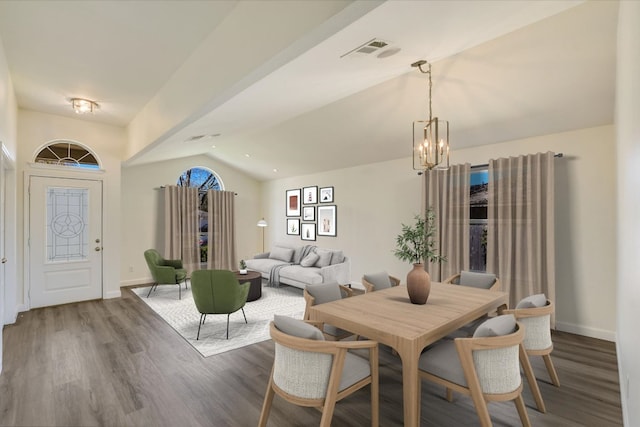 3905 Stonehenge Path, Round Rock, TX 78681 - dining space featuring vaulted ceiling, wood finished floors, and a chandelier