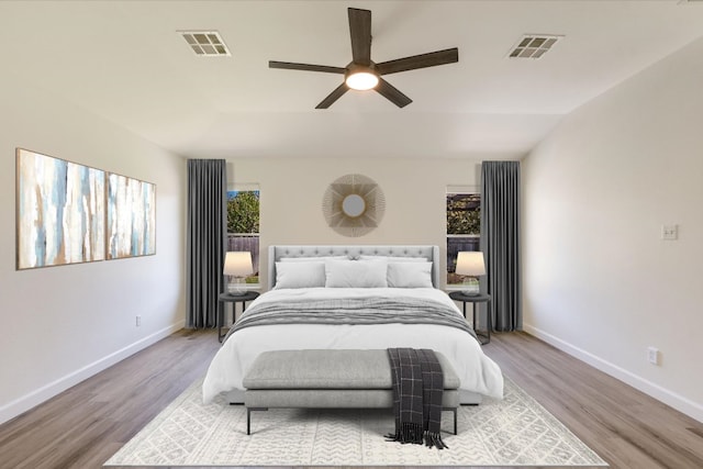 3905 Stonehenge Path, Round Rock, TX 78681 - bedroom with wood finished floors, baseboards, and ceiling fan