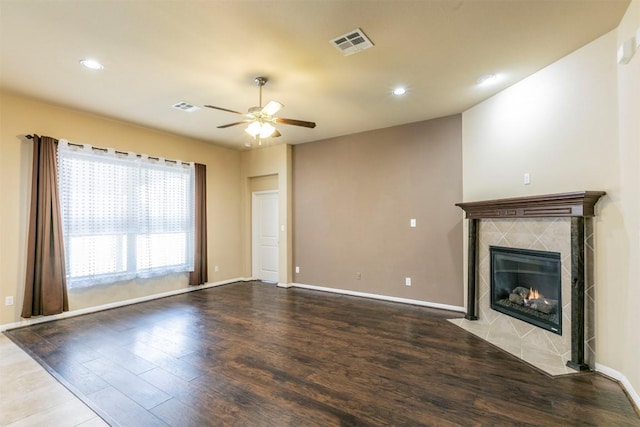 254 Chisholm Trl, Bastrop, TX 78602 - unfurnished living room with a ceiling fan, wood finished floors, a fireplace, and recessed lighting