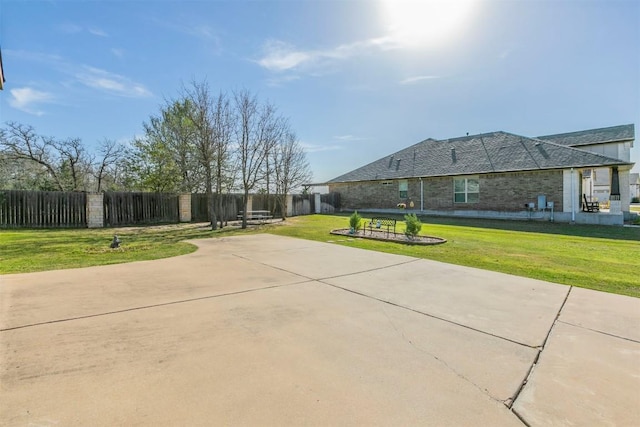 254 Chisholm Trl, Bastrop, TX 78602 - view of property's community with a fenced backyard and a patio area