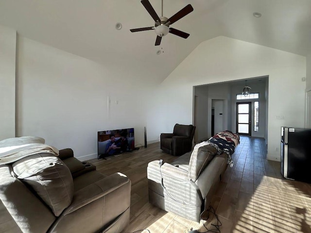 2905 Lago Costa Dr, La Marque, TX 77568 - living area featuring ceiling fan, lofted ceiling, and wood finished floors