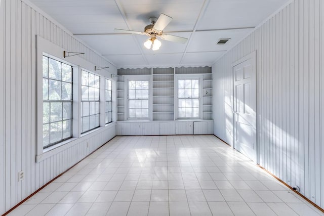 2710 Enfield Rd, Austin, TX 78703 - empty room featuring a healthy amount of sunlight, a ceiling fan, and visible vents
