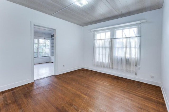 2710 Enfield Rd, Austin, TX 78703 - spare room with baseboards and wood-type flooring