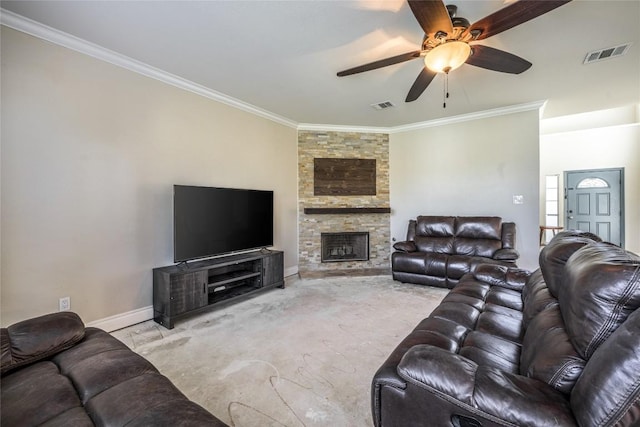 106 Remington Run, Bastrop, TX 78602 - living room with ornamental molding, a ceiling fan, a stone fireplace, and carpet