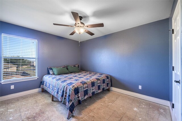106 Remington Run, Bastrop, TX 78602 - bedroom with baseboards and ceiling fan
