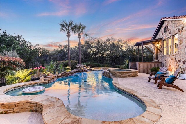 3312 Pearce Rd, Austin, TX 78730 - view of pool featuring a pool with connected hot tub and a patio area