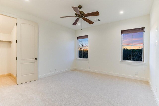 3312 Pearce Rd, Austin, TX 78730 - unfurnished bedroom featuring light colored carpet, recessed lighting, baseboards, and ceiling fan